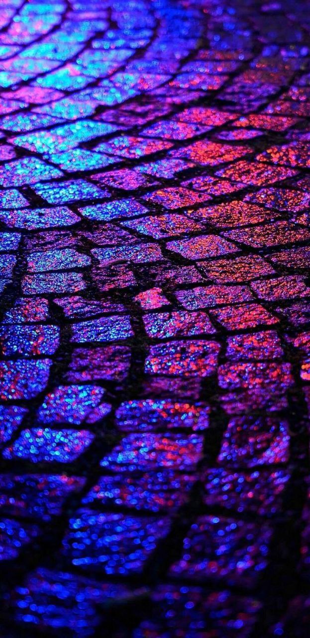 a close up of a purple brick